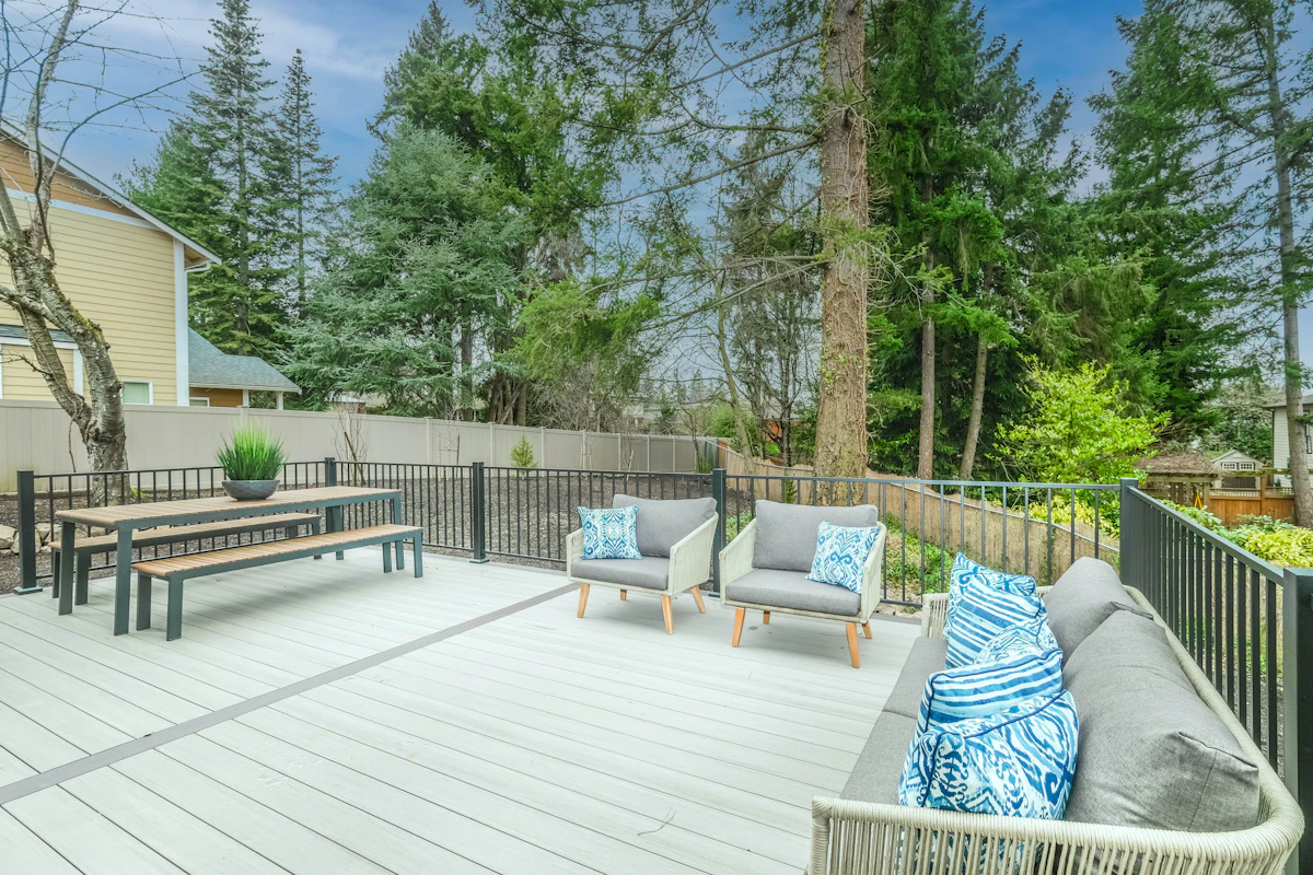 Wood deck with fresh stain in a backyard setting